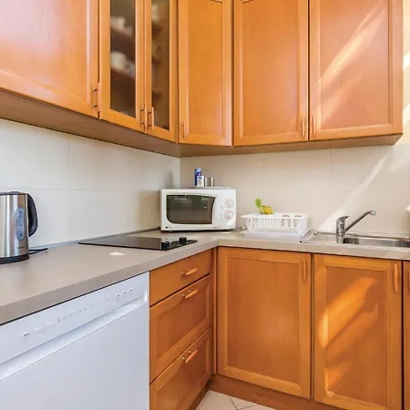 Апартаменты Lovely In With Kitchen